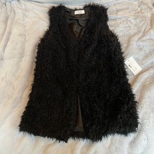 Black furry vest